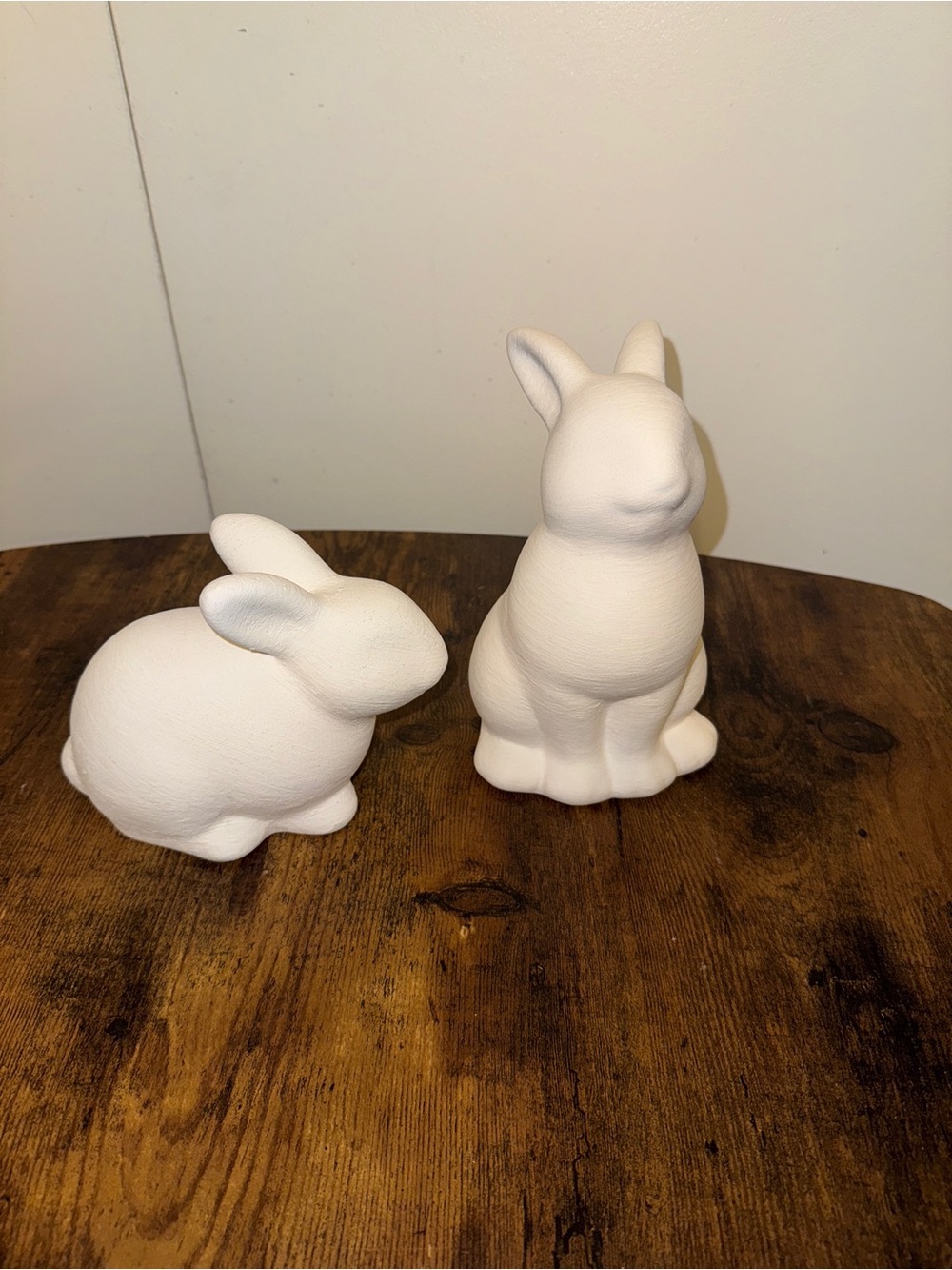 Two Ceramic Threshold Bunnies